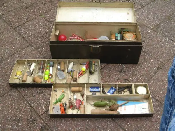 Vintage fishing tackle box and contents