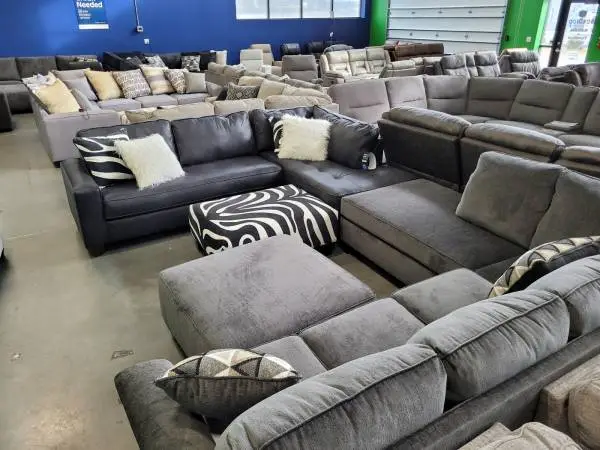 No waiting - in stock today! Clearing Out Over Stock Sectionals!