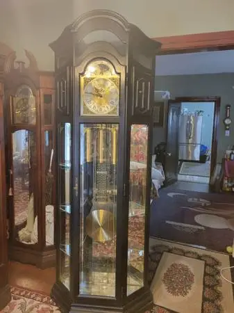 Vintage Grandfather Clock in Curio Cabinet