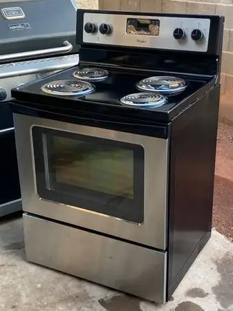 BLACK STAINLESS WHIRLPOOL ELECTRIC STOVE