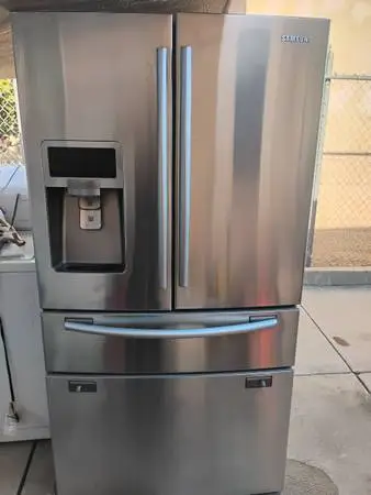 SAMSUNG STAINLESS STEEL SIDE BY SIDE FRIDGE