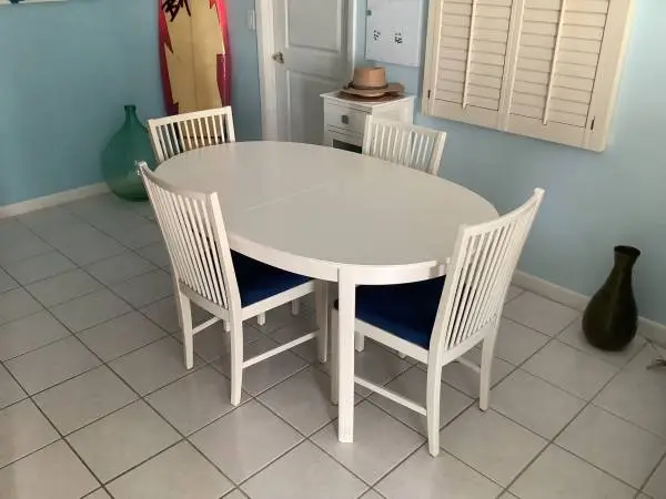 Coastal White Dining Room Table with 4 Chairs and built in leaf