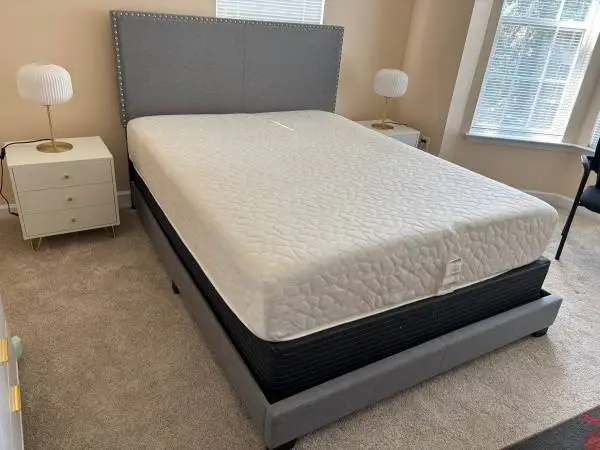 Beautiful queen size bed never slept in
