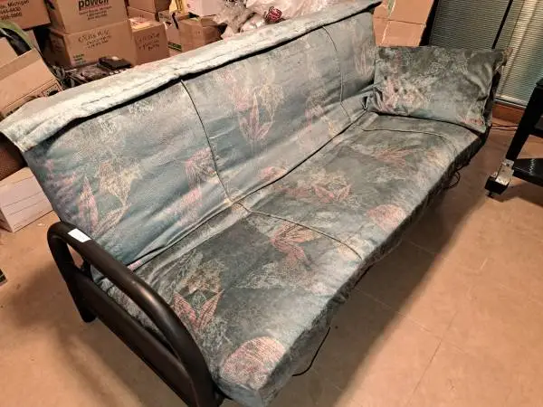 Full-size black metal-framed futon/ Midcentury Modern style