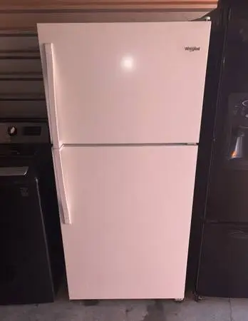 White Whirlpool Refrigerator And Freezer