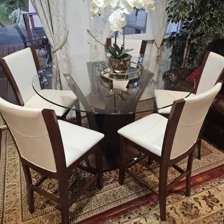 Glass tall round dinning table with 8 chairs