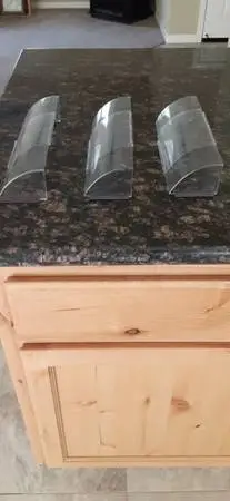 Heat, cooling, register air deflectors