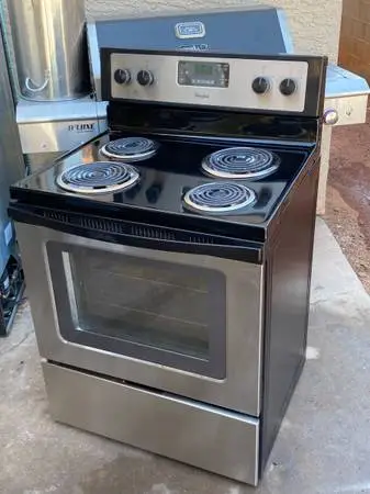 BLACK STAINLESS WHIRLPOOL ELECTRIC STOVE