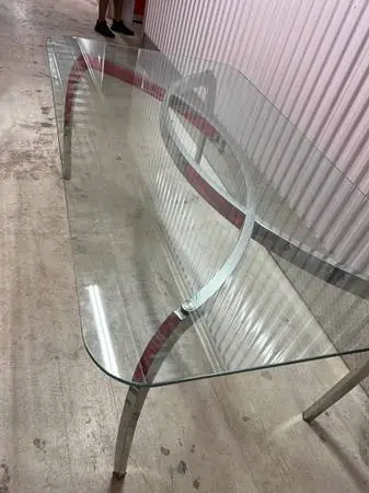 Glass top and chrome legs dining table