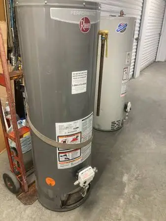 Hot water heater,Rheem 40 gal,gas,warranty,grey,hlp dlvr.