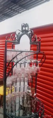 Antique ornate wrought iron wine liquor display Tower jail with lockin