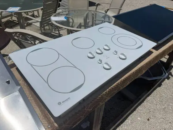36W White GE Monogram Cooktop Model # ZEU769TOC1WW Used Good Cond
