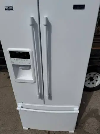 Clean white 33” wide refrigerator deliver installed