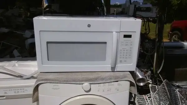 NEW  G E Microwave