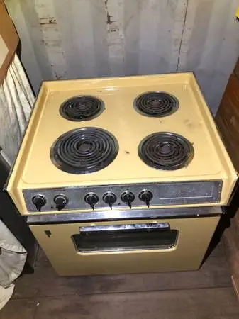 Drop in stove/oven with matching vent hood