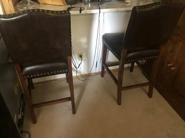 Two (2) Dark Brown Barstool w/Bronze Studs for $60