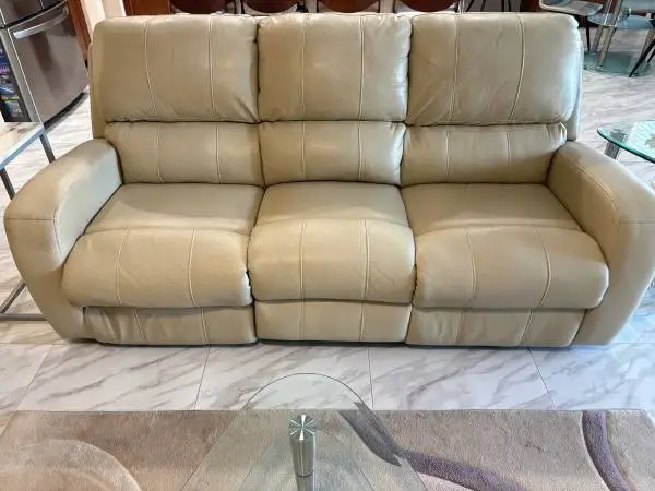 Great condition, tan, power reclining couch