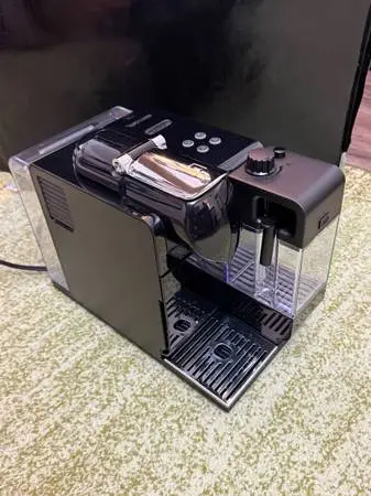Nespresso coffee machine. Capsules, and Milk Frother for lattes, cappuccinos. Li