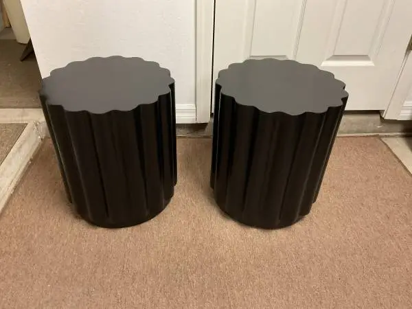 Two round ceramic tables or stands