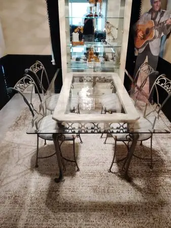 6 chairs and glass top iron frame table