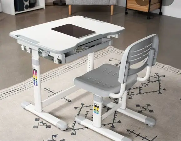 Kids adjustable desk with chair in excellent condition.