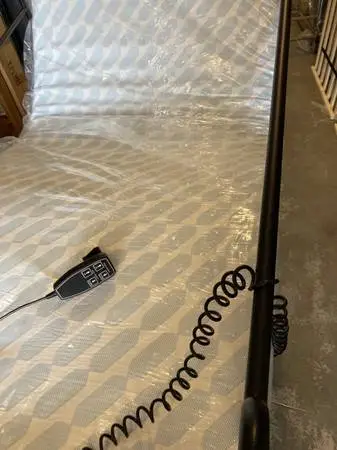 Twin XL size hospital bed and new mattress