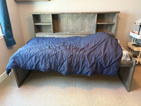 Twin bed frame with shelving headboard from AFW