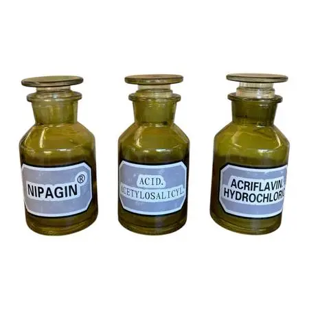 Set of 3 Vintage Olive Green Toned Glass Apothecary Bottles with Glass Stoppers.