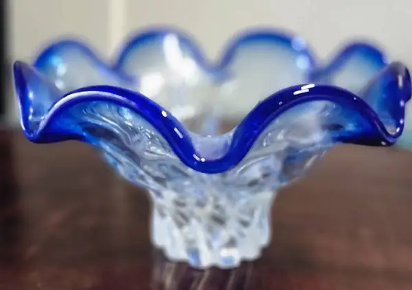 Cobalt blue to clear swirled glass