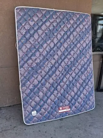 Comfortable double-sided American made queen size mattress in good con