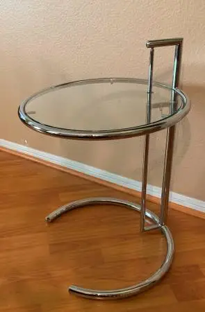 Contemporary double tier steel table with taper glass top