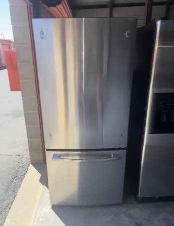 GE Stainless Steel Refrigerator And Freezer