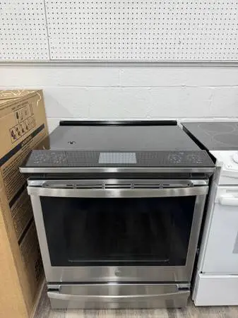 GE Profile 30”W Used Like New Slide In Induction Stove Excellent Condition