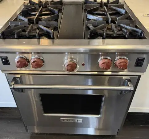 Subzero Stainless 36” Wide Built In Fridge/Wolf Gas Range 30” Wide