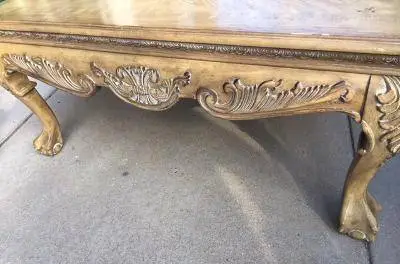 Classic & elegant coffee table. Light distressed finishing solid wood.