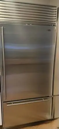Wolf Stainless Steel 36” Gas Range & Subzero Stainless 36” Fridge
