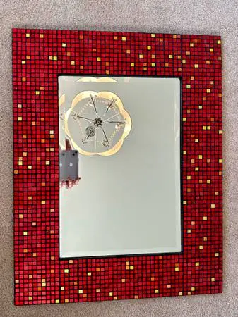 Red Framed Beveled Mirror.
