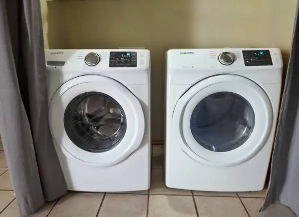 SAMSUNG FRONT LOAD WASHER AND ELECTRIC DRYER SET