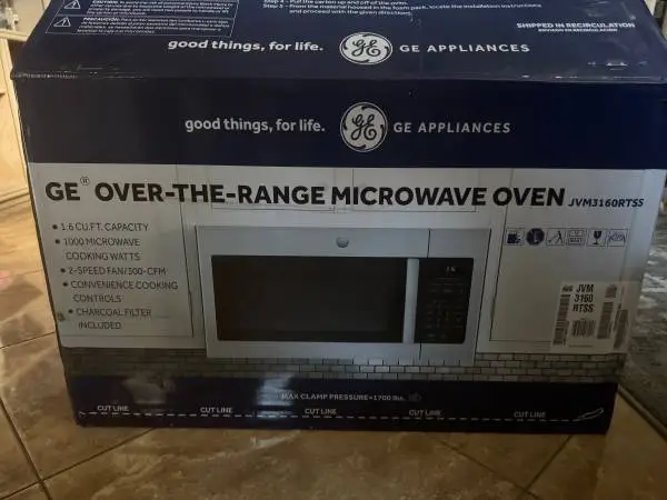 New opened box  GE 1.6-cu ft Over-the-Range Microwave ( Stainless Stee