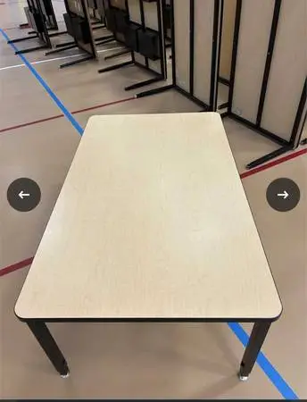 Adjustable height activity tables