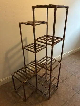 Like-new plant stand, nice looking, light weight, and sturdy