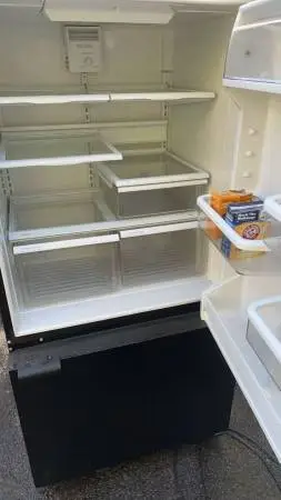 Whirlpool black refrigerator (delivery fee
