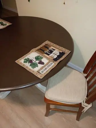 48 inch round table with 2 chairs, place mats and table cloth