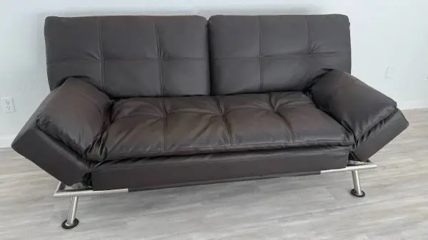 Futon/couch black faux leather. Excellent!