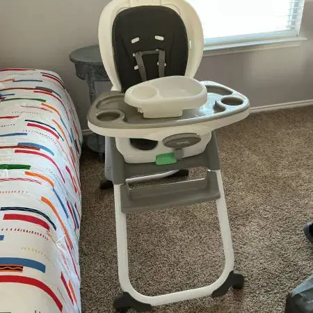 MOVING SALE:  Portable Crib and High Chair used 5 times