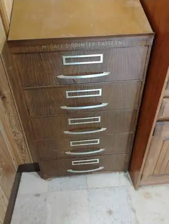 Vintage McCalls printed patterns cabinet