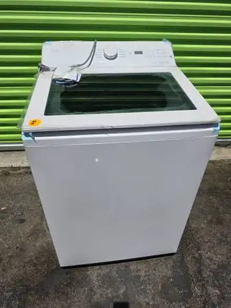 New lg 5.0 cu ft top load washer