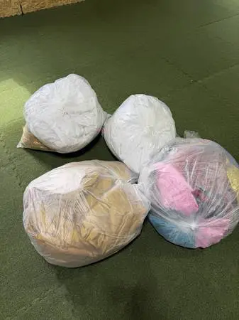 (4x) Bags of Assorted Tablecloths & Skirts