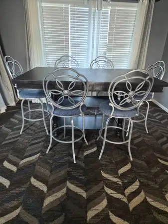 Dining room table and six chairs,love seat and two arm chairs