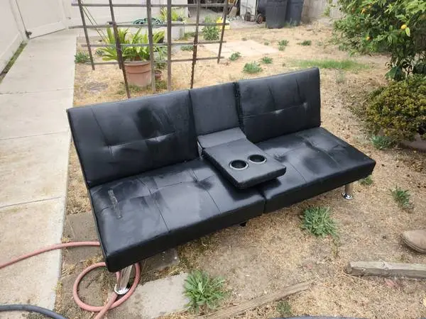 NICE LEATHER FOLDING COUCH / SLEEPER